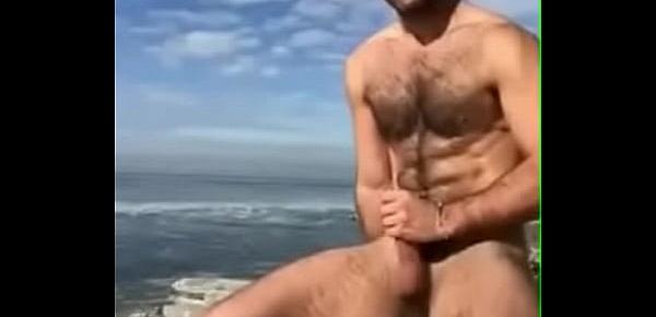  Fit Hairy Stud Quickly Jerks Off at the Beach!